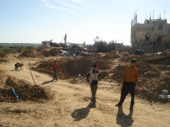 Boys are playing in between the ruins of Gaza City.